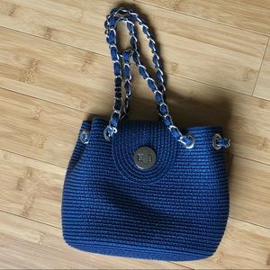 blue woven purse